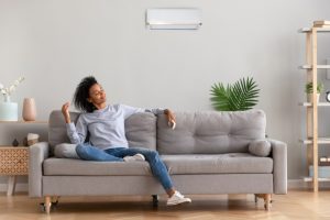 woman-sitting-in-modern-living-room-enjoying-comfort