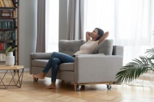 young-woman-looking-comfortable-on-couch