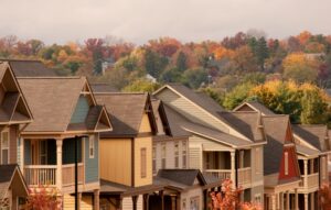 row-of-houses-with-orange-trees-in-background