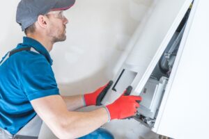 technician-working-on-heating-system
